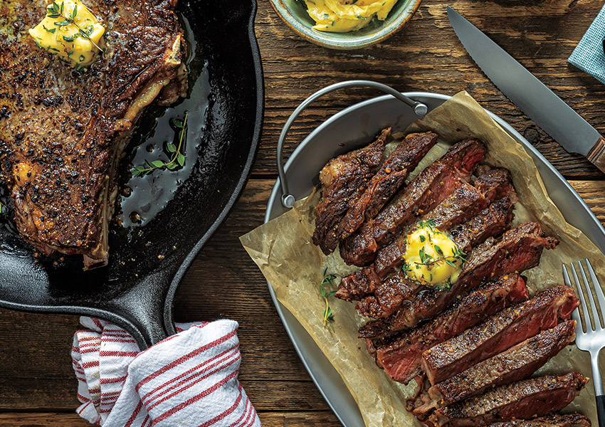 Pepper-Crusted Ribeye with Garlic-Thyme Butter